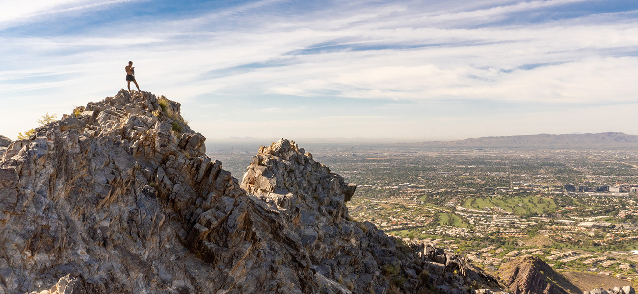 Person at the top of Piestewa Peak.