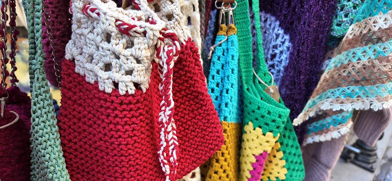 Colorful bags at a local art booth.